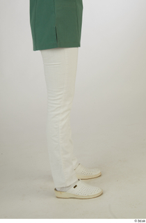 Daya Jones Nures in Green A Pose leg lower body…
